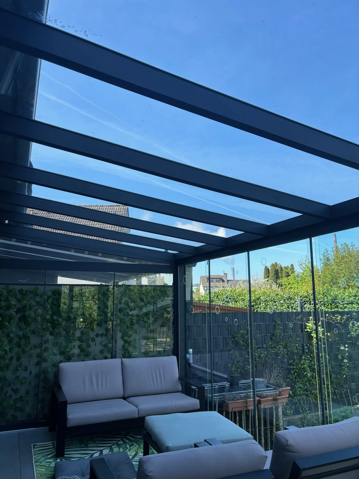 Terrassenüberdachung mit Glasdach und Seitenverglasung